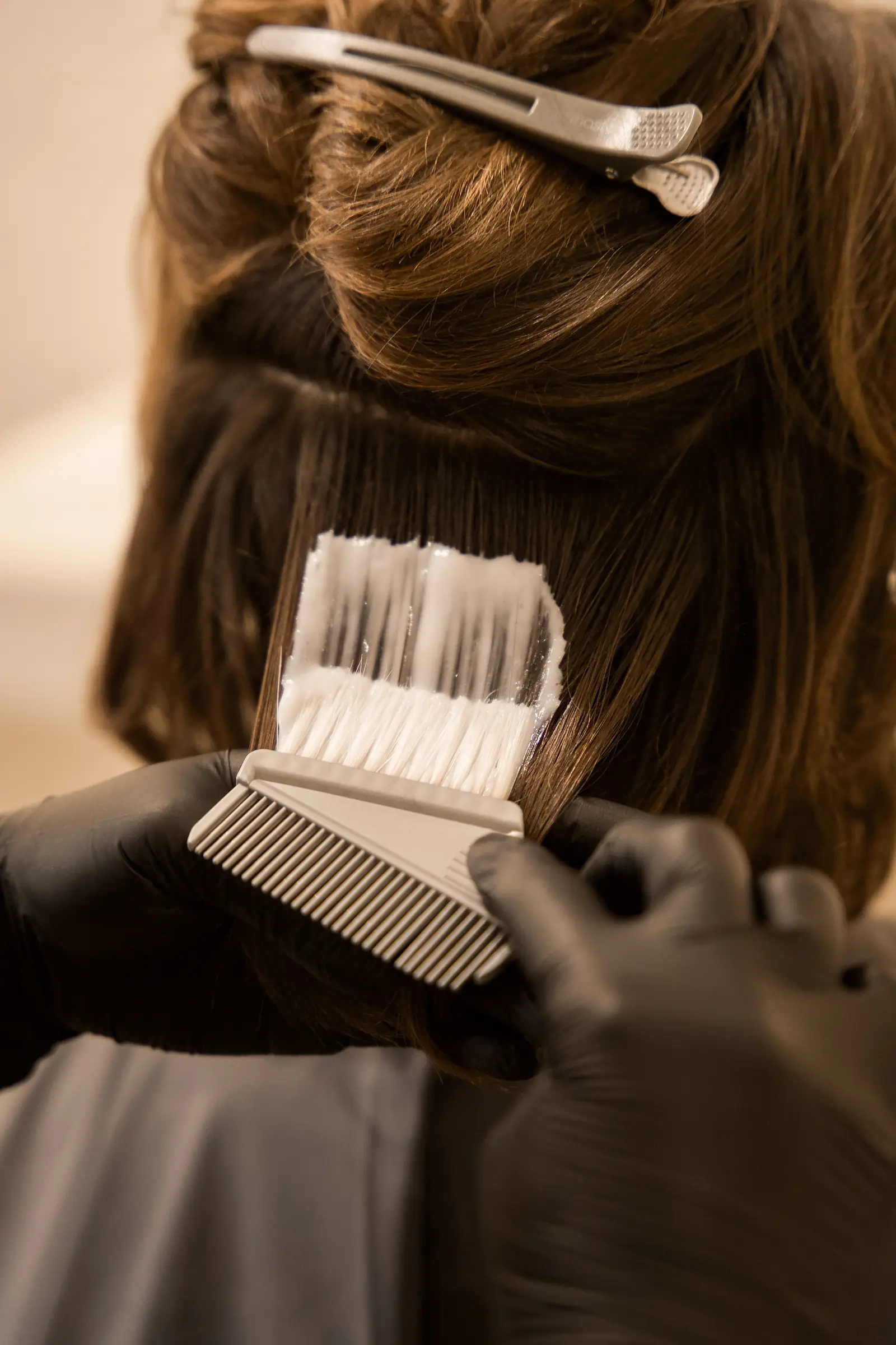 Scalp detox product brushed along the parting at Day Hair Habit