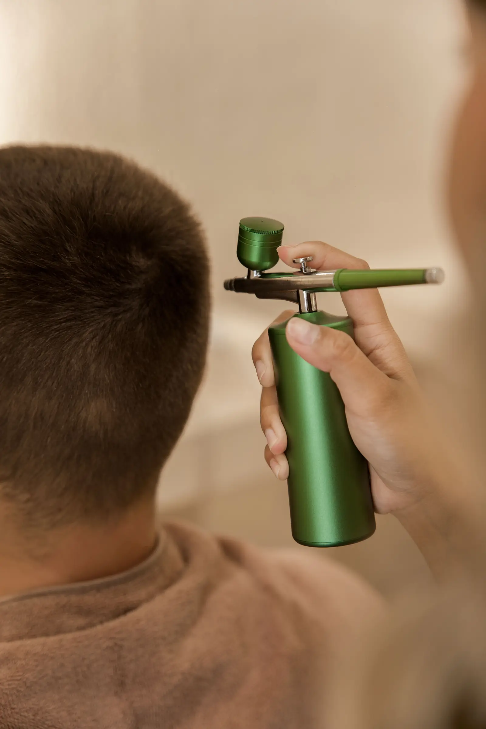 Scalp mist applied during the Day Dew Natural Treatment
