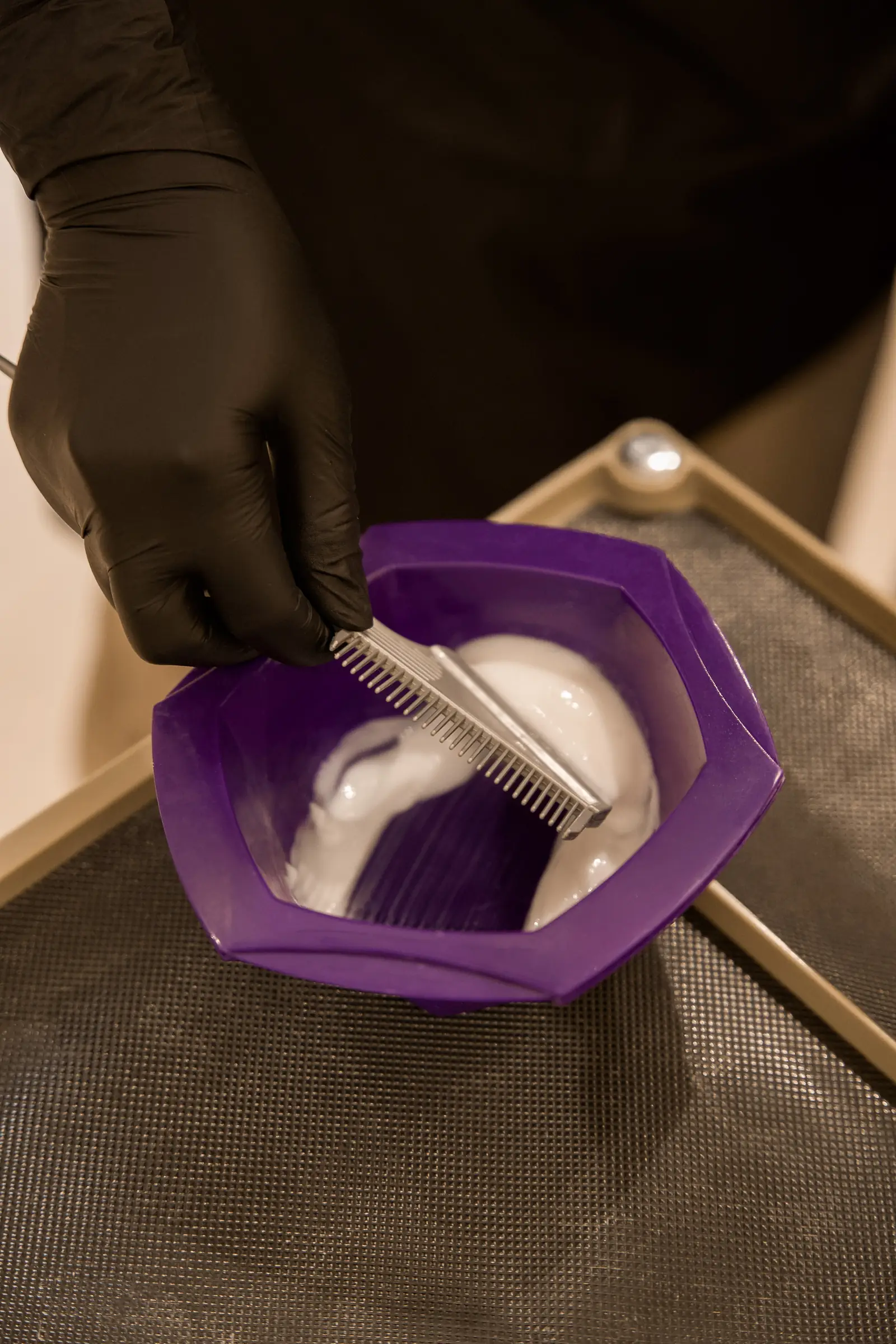 The treatment mixed in a salon bowl before it goes on